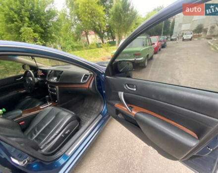 Синій Ніссан Теана, об'ємом двигуна 2.5 л та пробігом 240 тис. км за 6900 $, фото 14 на Automoto.ua