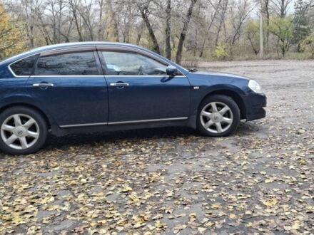 Синий Ниссан Теана, объемом двигателя 3.5 л и пробегом 205 тыс. км за 5000 $, фото 1 на Automoto.ua