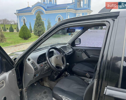 Чорний Ніссан Террано, об'ємом двигуна 2.39 л та пробігом 520 тис. км за 4400 $, фото 6 на Automoto.ua