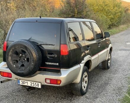Чорний Ніссан Террано, об'ємом двигуна 2.4 л та пробігом 220 тис. км за 2300 $, фото 4 на Automoto.ua