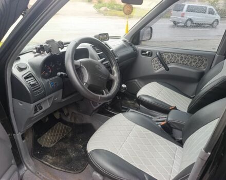 Черный Ниссан Террано, объемом двигателя 2.7 л и пробегом 270 тыс. км за 3500 $, фото 7 на Automoto.ua