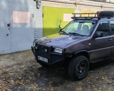 Серый Ниссан Террано, объемом двигателя 2.4 л и пробегом 400 тыс. км за 1892 $, фото 1 на Automoto.ua