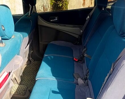 Серый Ниссан Тино, объемом двигателя 2 л и пробегом 315 тыс. км за 1100 $, фото 5 на Automoto.ua