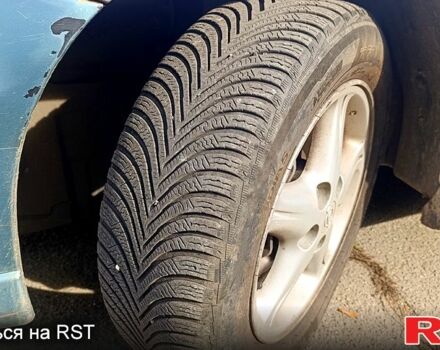 Серый Ниссан Тино, объемом двигателя 2 л и пробегом 315 тыс. км за 1100 $, фото 6 на Automoto.ua