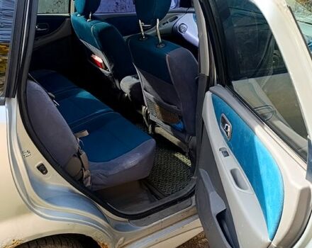 Серый Ниссан Тино, объемом двигателя 2 л и пробегом 315 тыс. км за 1100 $, фото 4 на Automoto.ua