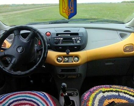 Зелений Ніссан Тіно, об'ємом двигуна 2.2 л та пробігом 350 тис. км за 2100 $, фото 8 на Automoto.ua