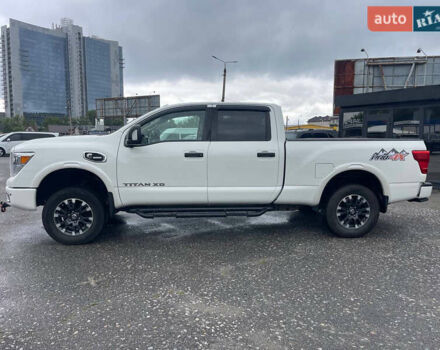 Белый Ниссан Титан, объемом двигателя 4.98 л и пробегом 330 тыс. км за 30000 $, фото 1 на Automoto.ua
