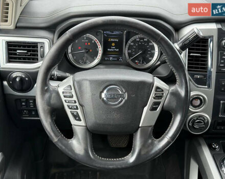 Белый Ниссан Титан, объемом двигателя 4.98 л и пробегом 330 тыс. км за 30000 $, фото 5 на Automoto.ua