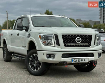 Белый Ниссан Титан, объемом двигателя 4.98 л и пробегом 330 тыс. км за 30000 $, фото 3 на Automoto.ua