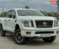 Белый Ниссан Титан, объемом двигателя 4.98 л и пробегом 330 тыс. км за 30000 $, фото 3 на Automoto.ua