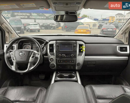 Белый Ниссан Титан, объемом двигателя 4.98 л и пробегом 330 тыс. км за 30000 $, фото 7 на Automoto.ua