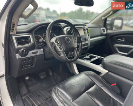 Белый Ниссан Титан, объемом двигателя 4.98 л и пробегом 330 тыс. км за 30000 $, фото 12 на Automoto.ua