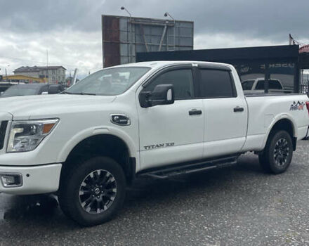 Белый Ниссан Титан, объемом двигателя 4.98 л и пробегом 330 тыс. км за 30000 $, фото 2 на Automoto.ua