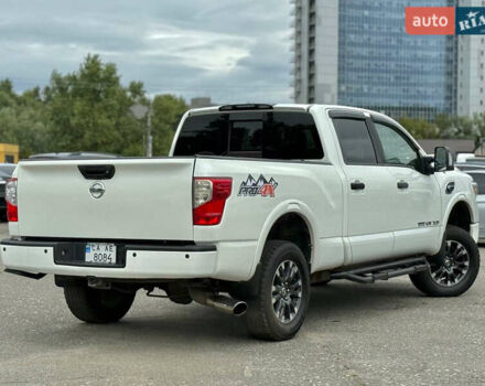 Белый Ниссан Титан, объемом двигателя 4.98 л и пробегом 330 тыс. км за 30000 $, фото 4 на Automoto.ua