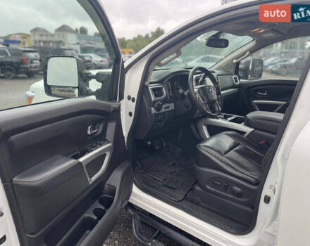 Белый Ниссан Титан, объемом двигателя 4.98 л и пробегом 330 тыс. км за 30000 $, фото 16 на Automoto.ua