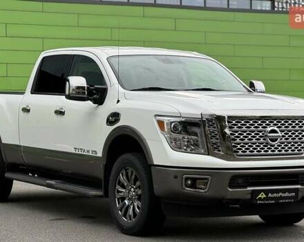 Белый Ниссан Титан, объемом двигателя 5.55 л и пробегом 28 тыс. км за 41000 $, фото 1 на Automoto.ua