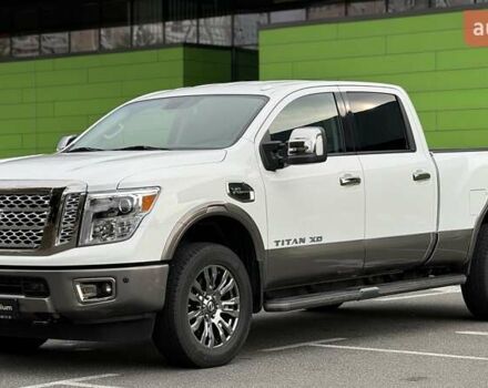 Белый Ниссан Титан, объемом двигателя 5.55 л и пробегом 28 тыс. км за 41000 $, фото 3 на Automoto.ua