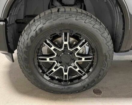 Черный Ниссан Титан, объемом двигателя 5.5 л и пробегом 150 тыс. км за 25000 $, фото 5 на Automoto.ua