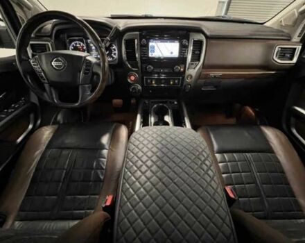 Черный Ниссан Титан, объемом двигателя 5.5 л и пробегом 150 тыс. км за 25000 $, фото 3 на Automoto.ua