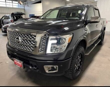 Черный Ниссан Титан, объемом двигателя 5.5 л и пробегом 150 тыс. км за 25000 $, фото 6 на Automoto.ua