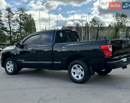 Черный Ниссан Титан, объемом двигателя 5.55 л и пробегом 47 тыс. км за 24900 $, фото 3 на Automoto.ua