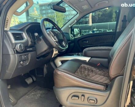 Черный Ниссан Титан, объемом двигателя 5.6 л и пробегом 69 тыс. км за 39999 $, фото 6 на Automoto.ua