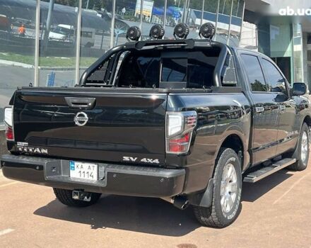 Черный Ниссан Титан, объемом двигателя 5.6 л и пробегом 69 тыс. км за 39999 $, фото 3 на Automoto.ua