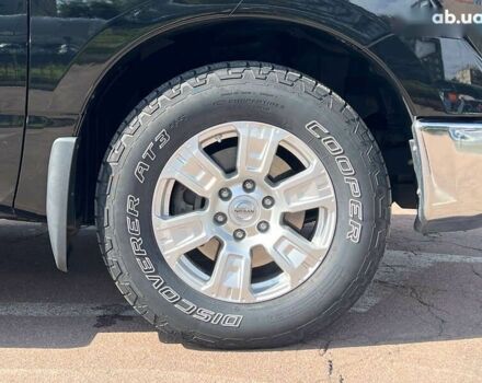 Черный Ниссан Титан, объемом двигателя 5.6 л и пробегом 69 тыс. км за 39999 $, фото 19 на Automoto.ua