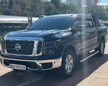 Черный Ниссан Титан, объемом двигателя 5.6 л и пробегом 69 тыс. км за 39999 $, фото 1 на Automoto.ua