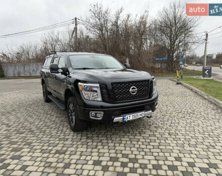 Чорний Ніссан Титан, об'ємом двигуна 5 л та пробігом 79 тис. км за 52000 $, фото 2 на Automoto.ua