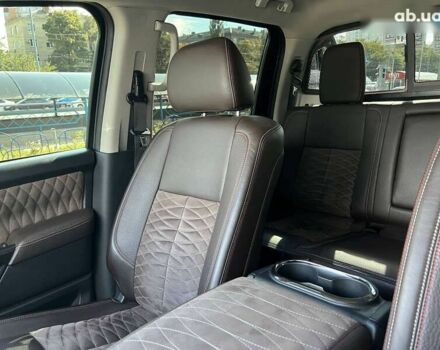 Черный Ниссан Титан, объемом двигателя 5.6 л и пробегом 69 тыс. км за 39999 $, фото 22 на Automoto.ua