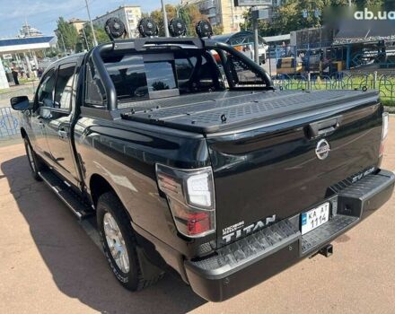 Черный Ниссан Титан, объемом двигателя 5.6 л и пробегом 69 тыс. км за 39999 $, фото 27 на Automoto.ua
