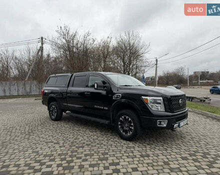 Чорний Ніссан Титан, об'ємом двигуна 5 л та пробігом 79 тис. км за 52000 $, фото 3 на Automoto.ua