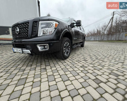Чорний Ніссан Титан, об'ємом двигуна 5 л та пробігом 79 тис. км за 52000 $, фото 1 на Automoto.ua