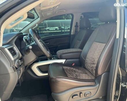 Черный Ниссан Титан, объемом двигателя 5.6 л и пробегом 69 тыс. км за 39999 $, фото 7 на Automoto.ua