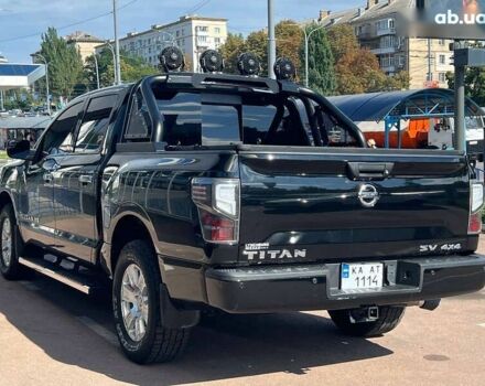 Черный Ниссан Титан, объемом двигателя 5.6 л и пробегом 69 тыс. км за 39999 $, фото 4 на Automoto.ua