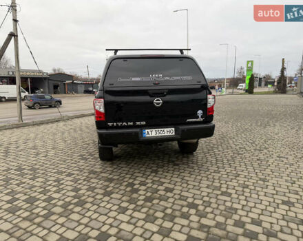 Чорний Ніссан Титан, об'ємом двигуна 5 л та пробігом 79 тис. км за 52000 $, фото 5 на Automoto.ua