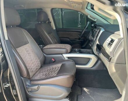 Черный Ниссан Титан, объемом двигателя 5.6 л и пробегом 69 тыс. км за 39999 $, фото 8 на Automoto.ua