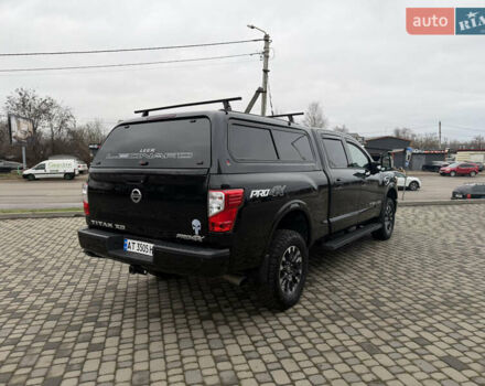 Чорний Ніссан Титан, об'ємом двигуна 5 л та пробігом 79 тис. км за 52000 $, фото 4 на Automoto.ua