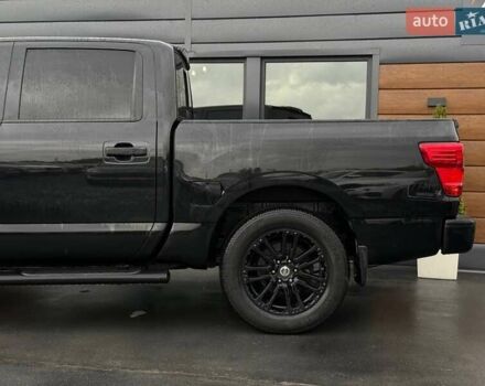 Черный Ниссан Титан, объемом двигателя 5.56 л и пробегом 160 тыс. км за 29999 $, фото 7 на Automoto.ua