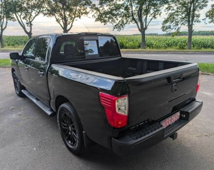 Черный Ниссан Титан, объемом двигателя 5.6 л и пробегом 160 тыс. км за 26999 $, фото 17 на Automoto.ua