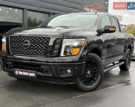 Черный Ниссан Титан, объемом двигателя 5.56 л и пробегом 160 тыс. км за 29999 $, фото 1 на Automoto.ua