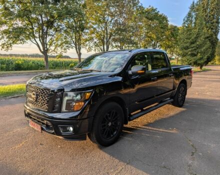 Черный Ниссан Титан, объемом двигателя 5.6 л и пробегом 160 тыс. км за 26999 $, фото 1 на Automoto.ua