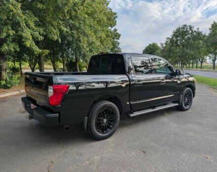 Черный Ниссан Титан, объемом двигателя 5.6 л и пробегом 160 тыс. км за 26999 $, фото 10 на Automoto.ua