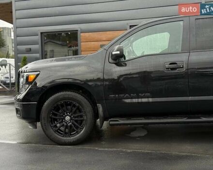 Черный Ниссан Титан, объемом двигателя 5.56 л и пробегом 160 тыс. км за 29999 $, фото 6 на Automoto.ua