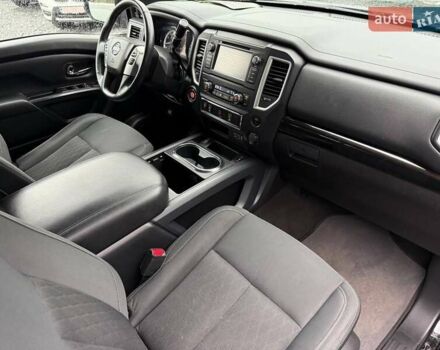 Черный Ниссан Титан, объемом двигателя 5.56 л и пробегом 160 тыс. км за 29999 $, фото 61 на Automoto.ua