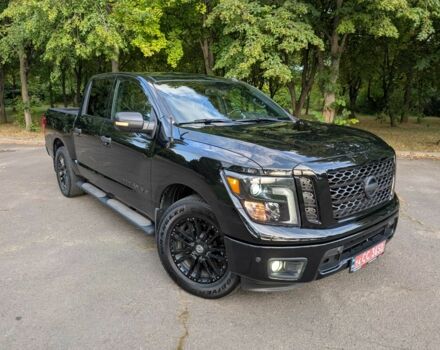 Черный Ниссан Титан, объемом двигателя 5.6 л и пробегом 160 тыс. км за 26999 $, фото 4 на Automoto.ua