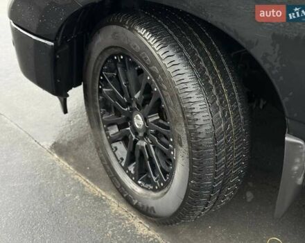 Черный Ниссан Титан, объемом двигателя 5.56 л и пробегом 160 тыс. км за 29999 $, фото 4 на Automoto.ua