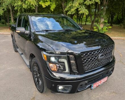 Черный Ниссан Титан, объемом двигателя 5.6 л и пробегом 160 тыс. км за 26999 $, фото 14 на Automoto.ua