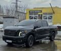 Черный Ниссан Титан, объемом двигателя 5.6 л и пробегом 162 тыс. км за 33500 $, фото 1 на Automoto.ua